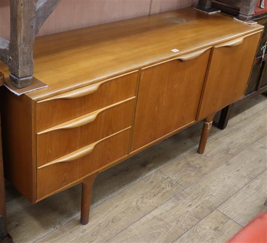 A McIntosh teak sideboard, fitted three small drawers and two cupboards W.152cm